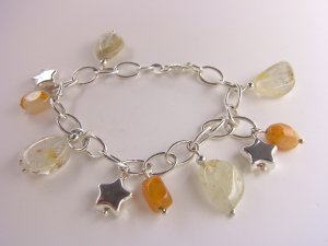 Silver charm bracelet with crackle quartz,carnelian drops and silver star charms