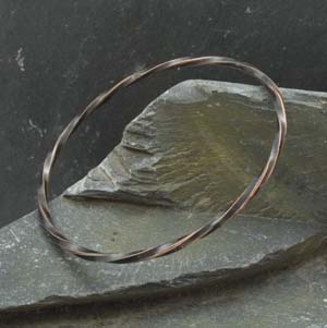 Small twisted wire oxidised copper bangle