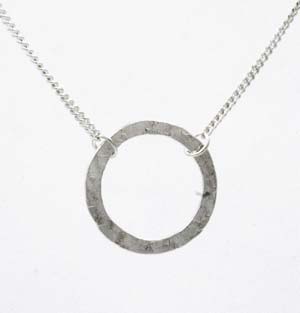 Silver round washer type hammered effect pendant