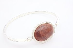 Silver bangle with  oval brachiated jasper cabochon