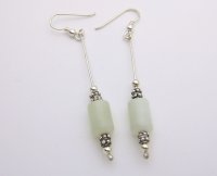 Jade oval cylinders with silver beads strung on silver wire from Gracie Mae